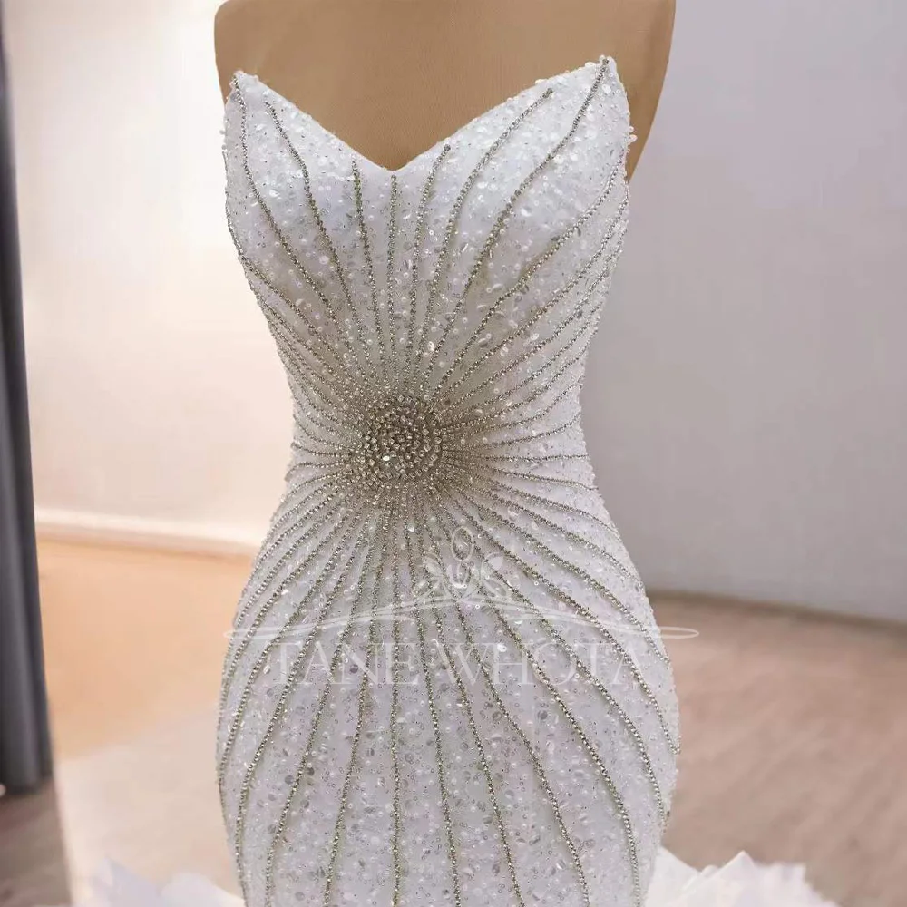 ชุดแต่งงานแบบไม่มีแขน ดีไซน์เซ็กซี่หวานซึ้ง ประดับด้วยลูกปัดและเลื่อม แต่งเชือกผูกด้านหลัง ทรงเข้ารูป สามารถสั่งตัดได้ สวยสง่างาม ทันสมัย