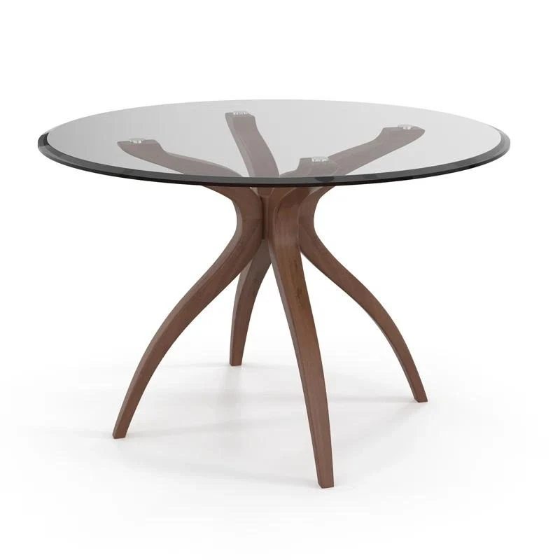 

Nordic minimalist designer solid wood round dining table North American black walnut home minimalist creative restaurant
