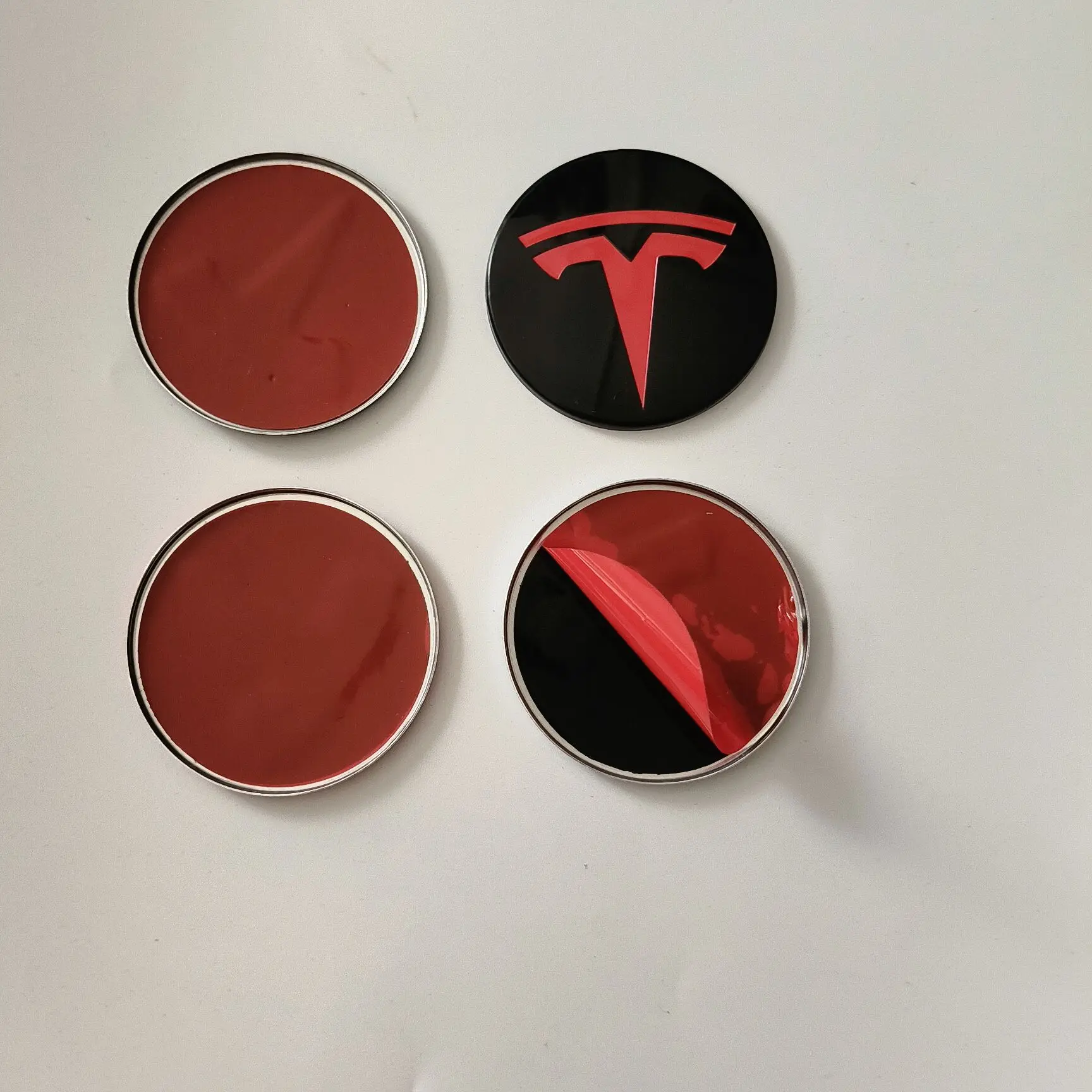 4 Stück 56mm 57mm Auto-Radnabenkappen Emblem-Aufkleber für Tesla Model 3 Y S X Roadster P75D P85D P90D P100D Auto-Zubehör