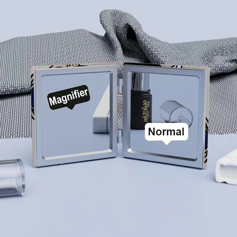 Blood Eye Mini faltbarer tragbarer doppelseitiger hochklappbarer PU-Schminkspiegel Normaler und vergrößernder Spiegelkamm mit magnetischer Saugkraft