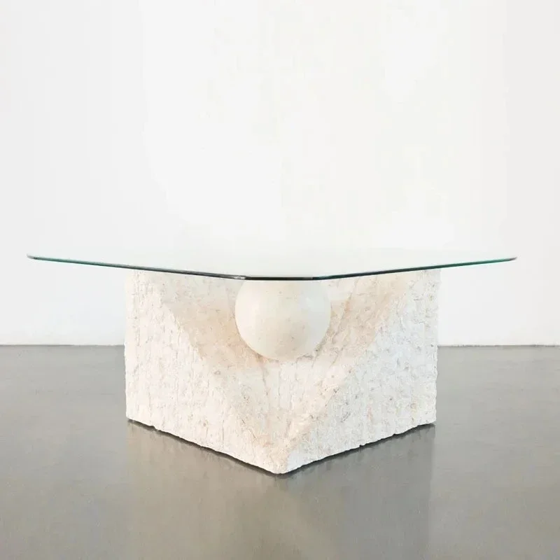 

A Retro travertine, coffee table natural material stone table old, broken glass coffee table