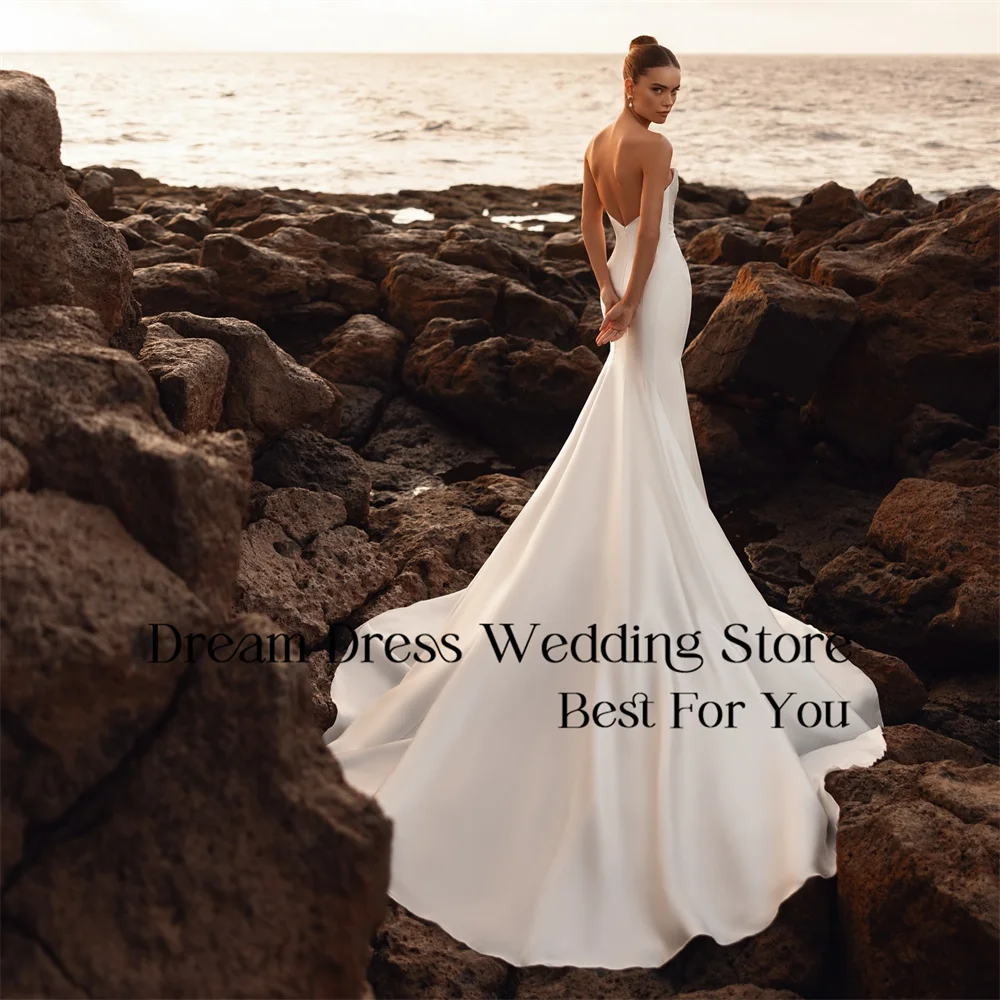 DREAM Abito da sposa moderno con pieghe a sirena 2025 Abito da sposa in raso con scollo a barca aperto sul retro con strascico lungo Abiti da sposa personalizzati