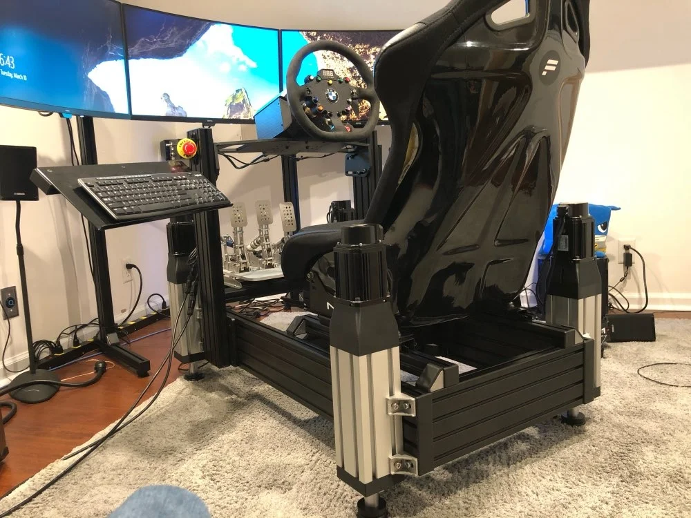 OEM/ODM 4DOF +TL+ Surge Simulator Seat Car Driving Competition Sim Cockpit Game Racing Simulator Home Use Anum 750W Motion