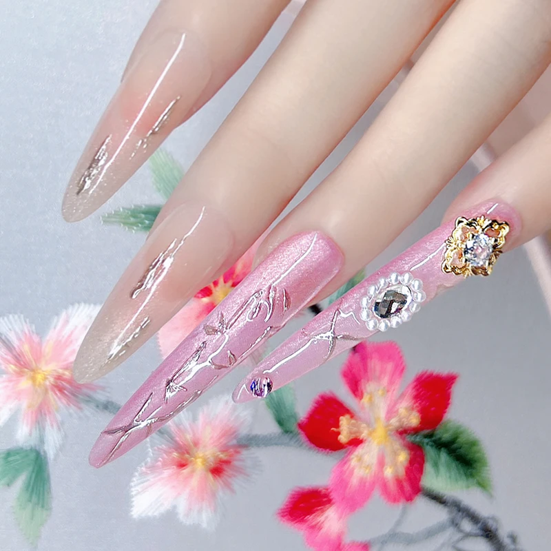 

14 шт. (4 длинных + 10 коротких) накладных ногтях, розовый с серебряным декором из стразов, длинная форма шпильки для милой элегантности
