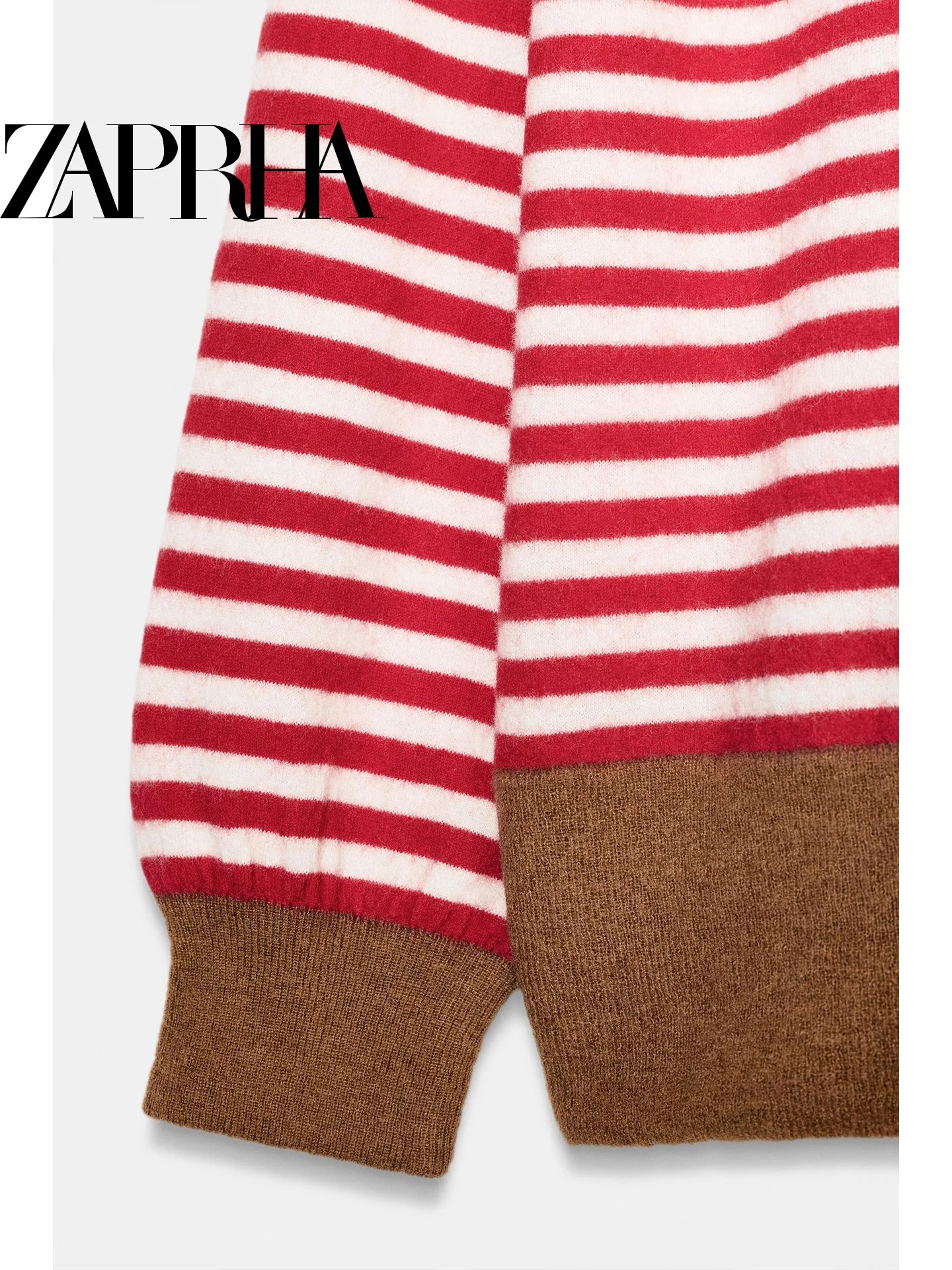 เสื้อถักลายทางทรงหลวม สปริง 2026 คอกลม แขนยาว สไตล์ลำลอง ช่วยให้ดูผอมเพรียว แฟชั่นสำหรับผู้หญิง