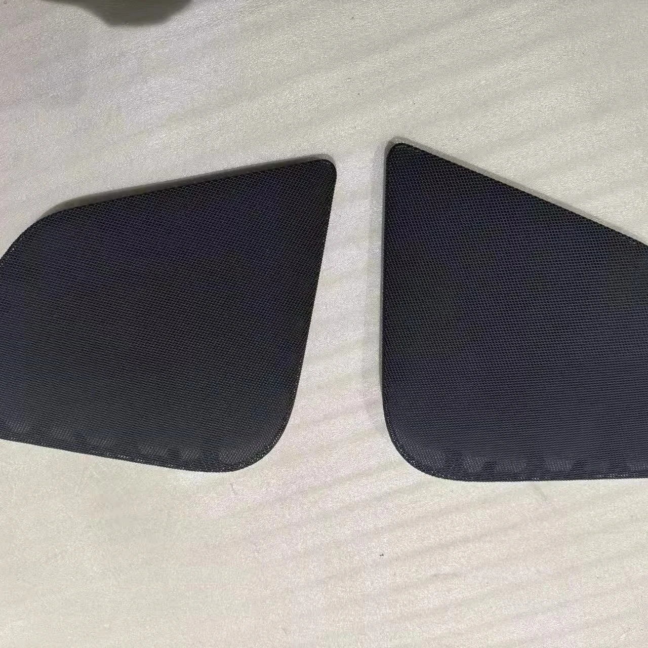 

2025 Tesla Model Y Highland front door trim panel black horn hood