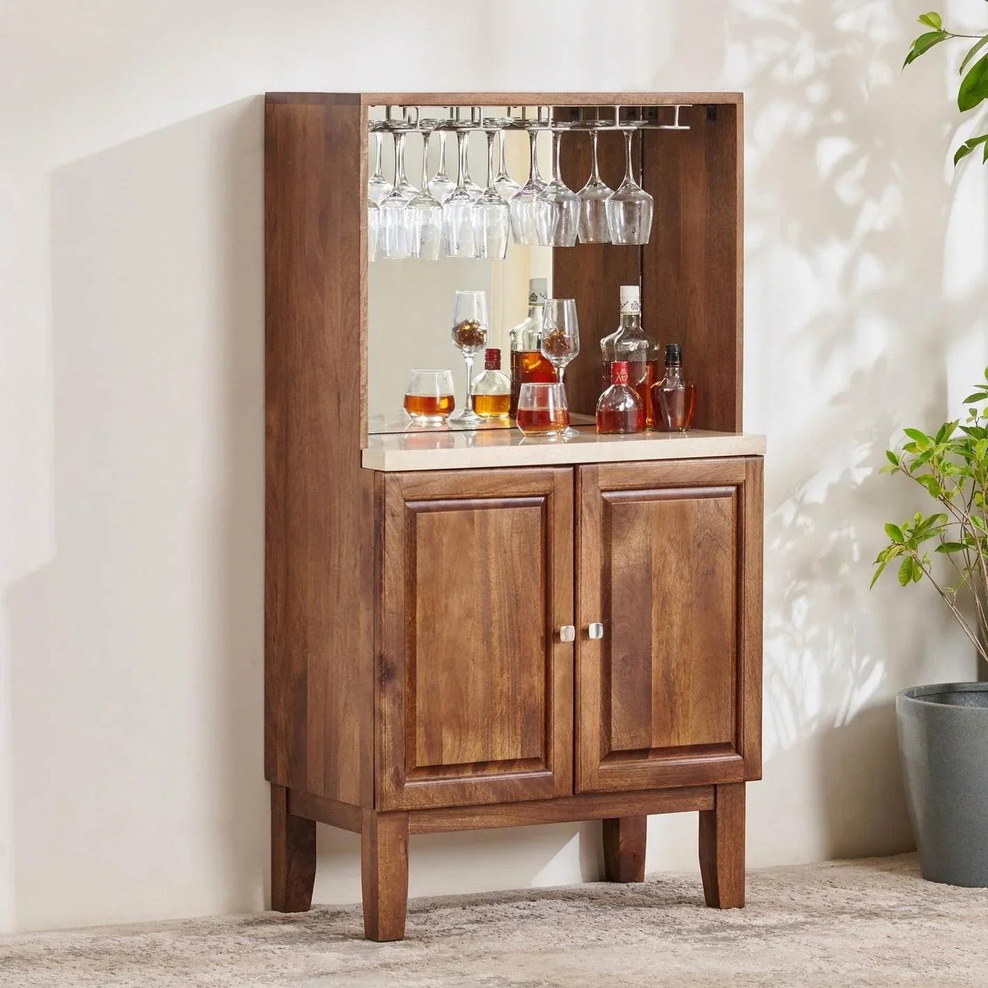 

Sturdy Mango Wood Bar Cabinet with Composite Marble Finish and Ample Storage