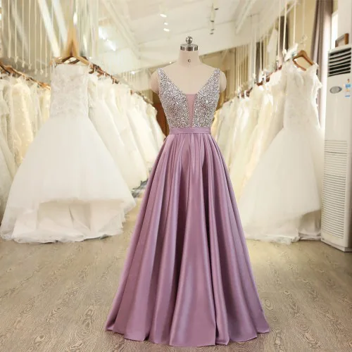 セクシーな手作りの深いVネックのイブニングドレス、ファッショナブルなミッドウエストAラインスカート、結婚式やパフォーマンスに適したポリエステル100%