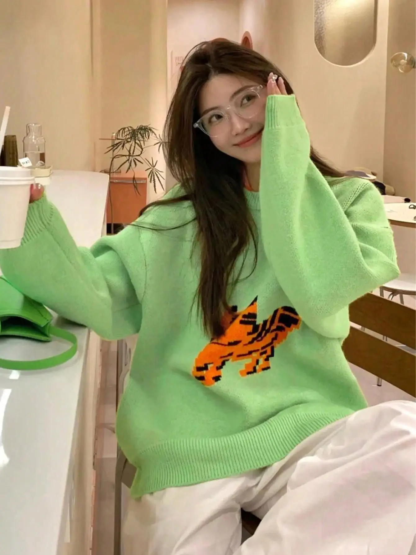 En محبوك سترة المرأة Faionable الكورية Sle الخريف الربيع الراقية الإحساس ular بلوزة جميلة للشابات