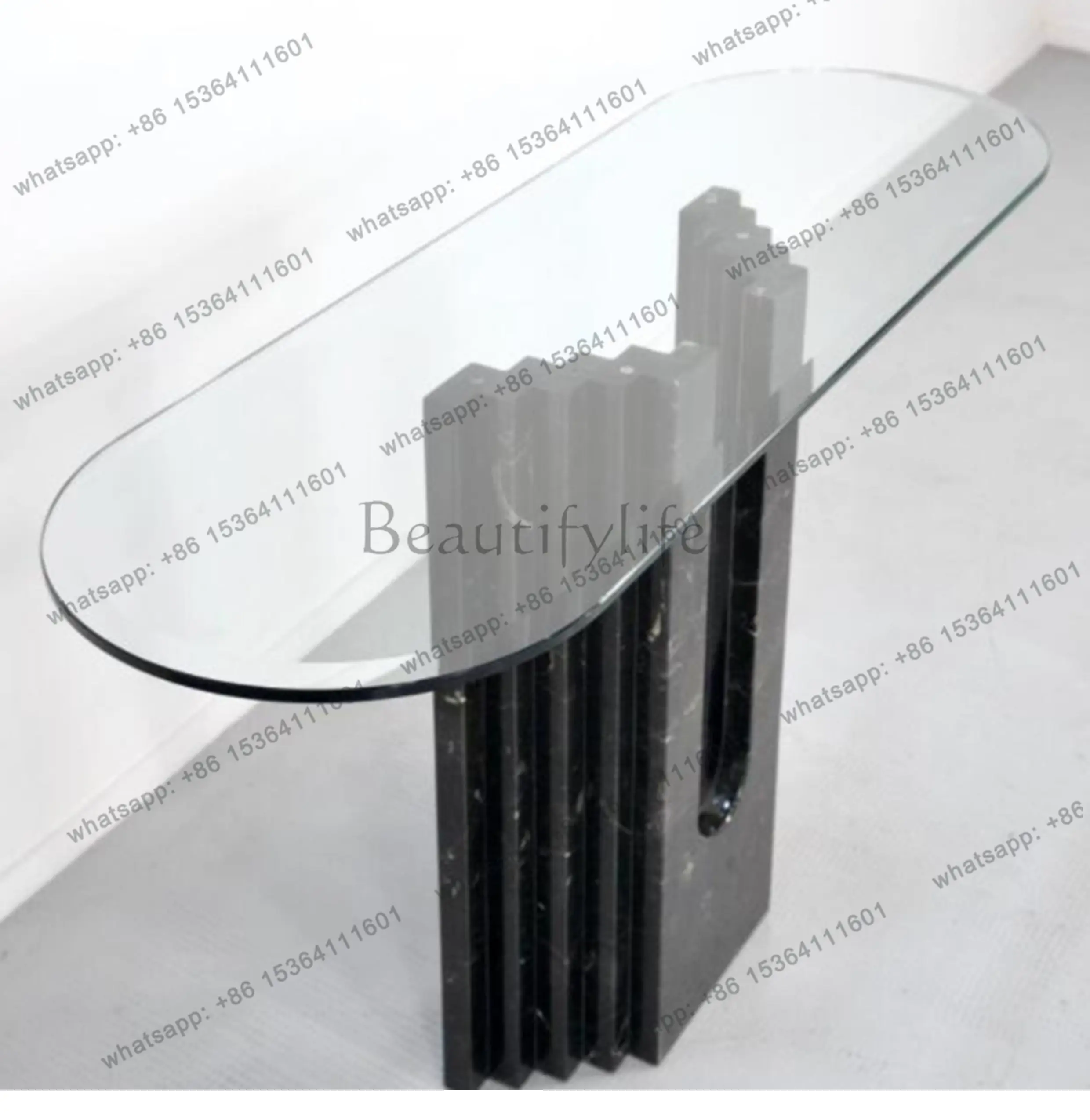 

Modern and simple, marble entrance table against the wall, tempered glass against the wall, narrow side table