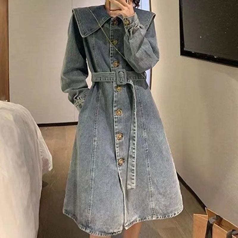 

Design sense lotus leaf collar niche denim skirt female autumn and winter fashion slim tall joker temperament high sense dress.