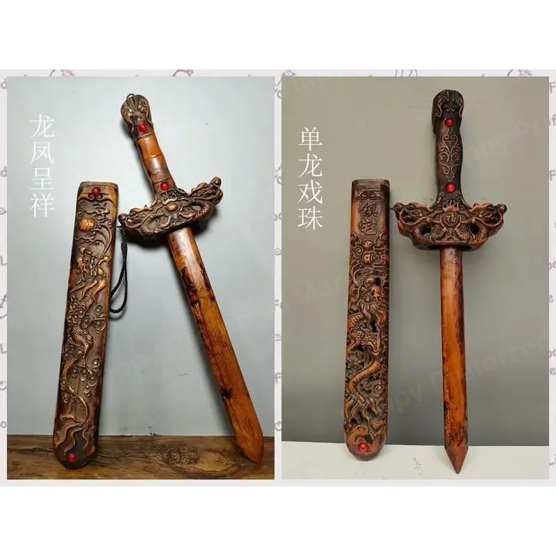 old peach wood sword with double-sided carving