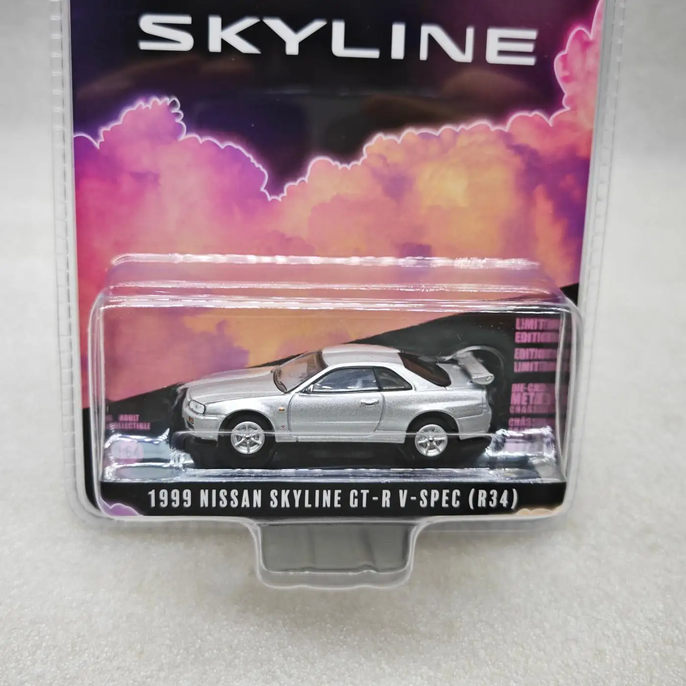 

Юбилейная серия 17-1999 Nissan Skyline V-Spec R3 Модель игрушечного автомобиля