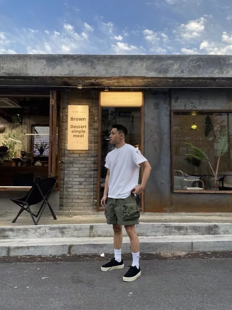 Amerykańskie spodnie dresowe męskie, uniwersalne, codzienne, outdoorowe, wielofunkcyjne, letnie, lekkie, do kolan, jednokolorowe.