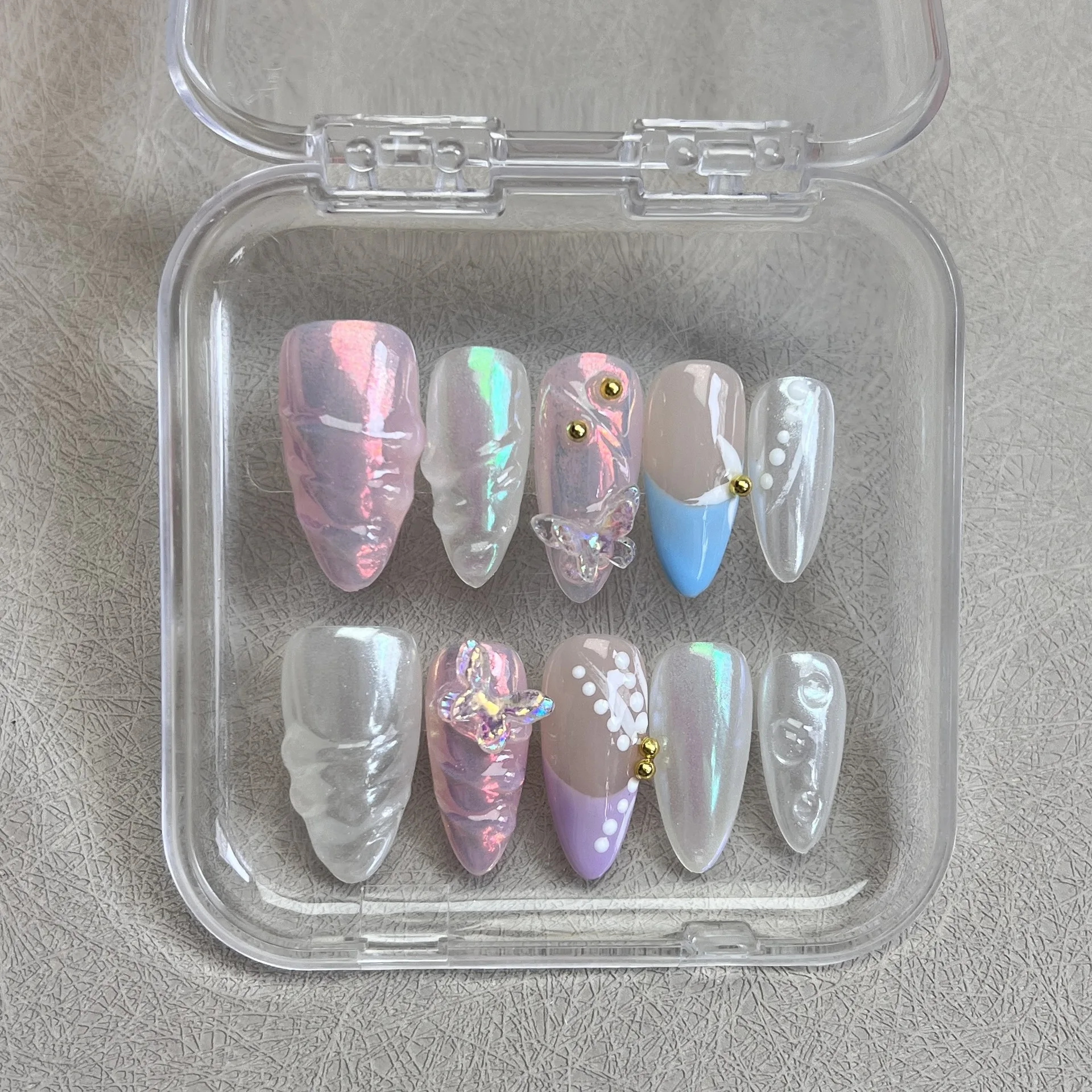 10 Uds. De uñas postizas hechas a mano con diseño de mariposa Aurora colorida en 3D, uñas postizas de almendra francesa brillantes con caja