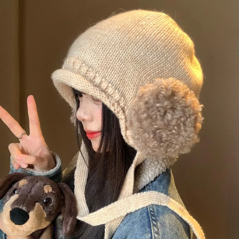 Koreanische, schlichte, gestrickte Mütze mit Schnürung und Plüsch-Ohrpolsterung für Damen, ideal für Herbst und Winter, als warme Outdoor-Bombermütze. – Detail 1