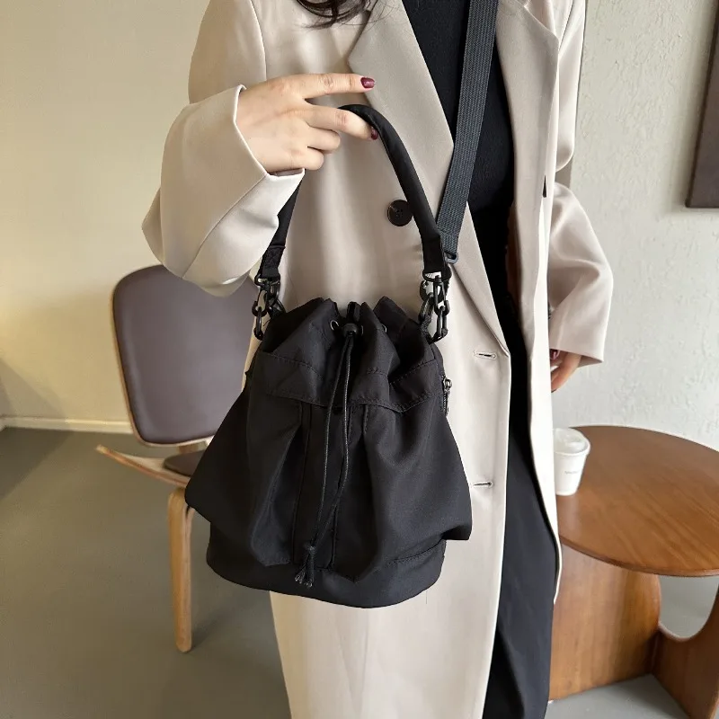 

Stylish Nylon Drawstring Bucket Bag Casual Handbag with Adjustable Strap Daily Crossbody/Shoulder Bag for Modern Fashion Lovers