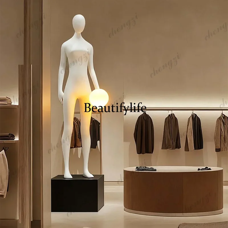 03 Standing with a ball in one hand Humanoid sculpture Floor lamp Modern art Characters Creative decoration