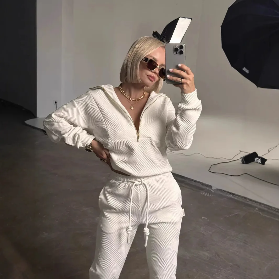 

Casual European and American women's set, solid color long sleeved zipper loose top, lace up pants two-piece set