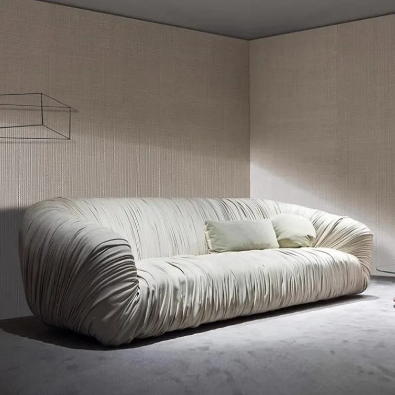 Light luxury designer living room leather art sofa simple creative small apartment special-shaped pleated three-person sofa