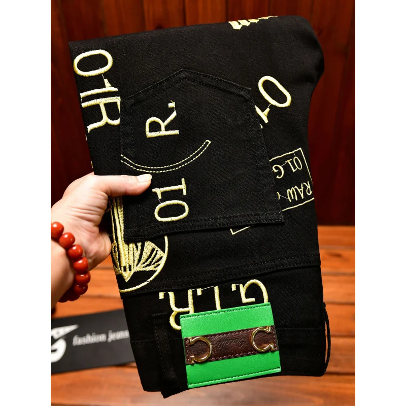 بنطال جينز مطبوع ومطرز على الموضة الفاخرة الخفيفة للرجال باللون الأسود بقصة ضيقة وأقدام صغيرة وسراويل خريف رائعة للشارع #1