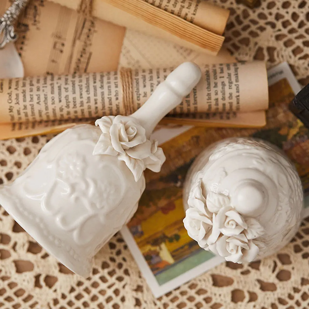 

1Pcs Ceramic Carved Adornment Vintage Hand Bell for Restaurant Service Call Desktop Ornament Decorative Retro Bell White