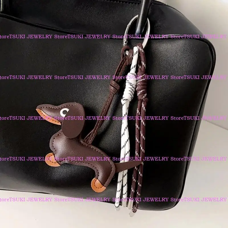 62KE الجلود الجلدية المدمن على حبل مضفر معلقة زخرفة سلسلة مفاتيح القلادة لمفاتيح السيارات وأكياس سحر ملحقات سحر