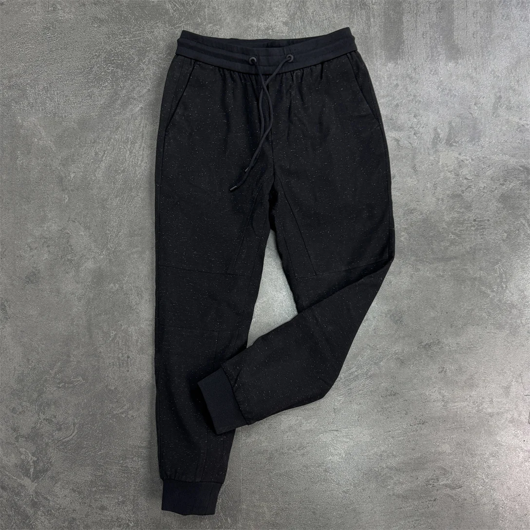 

Модные эластичные повседневные трикотажные спортивные брюки для мужчин с высокой талией, на резинке, с манжетами, не мнущиеся, весенние, из полиэстеровой смеси