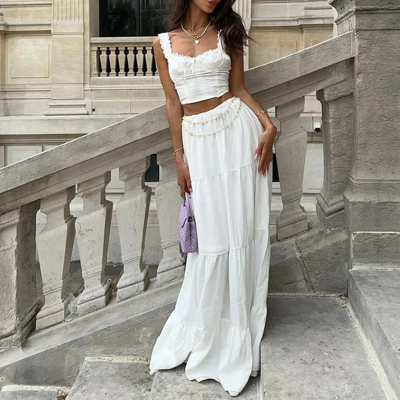 Seksowny komplet: koronkowa bluzka na ramiączkach z odkrytymi ramionami i długa spódnica, elegancki strój damski z wysokim stanem w stylu college, codzienny, bez rękawów, jednolity kolor, zestaw 2-częściowy.