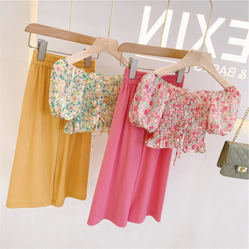 

Girls' outfit: floral ruched off-shoulder doll top and wide-leg pants26New summer children's clothing wholesale