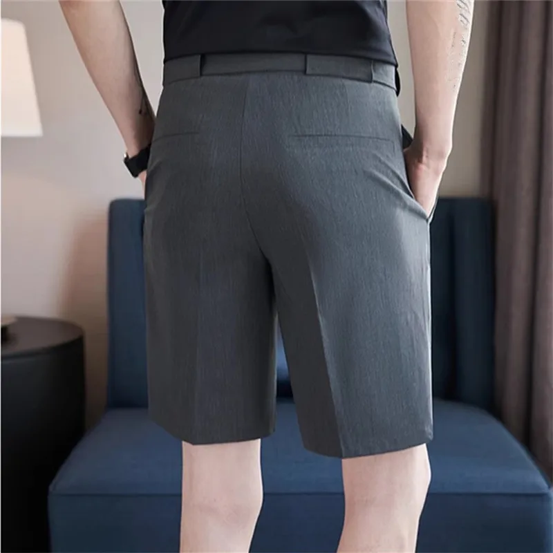Pantaloncini da abito estivi da uomo Moda stile Inghilterra Pantaloncini casual slim dritti da uomo Tinta unita Comodo elastico in vita al ginocchio