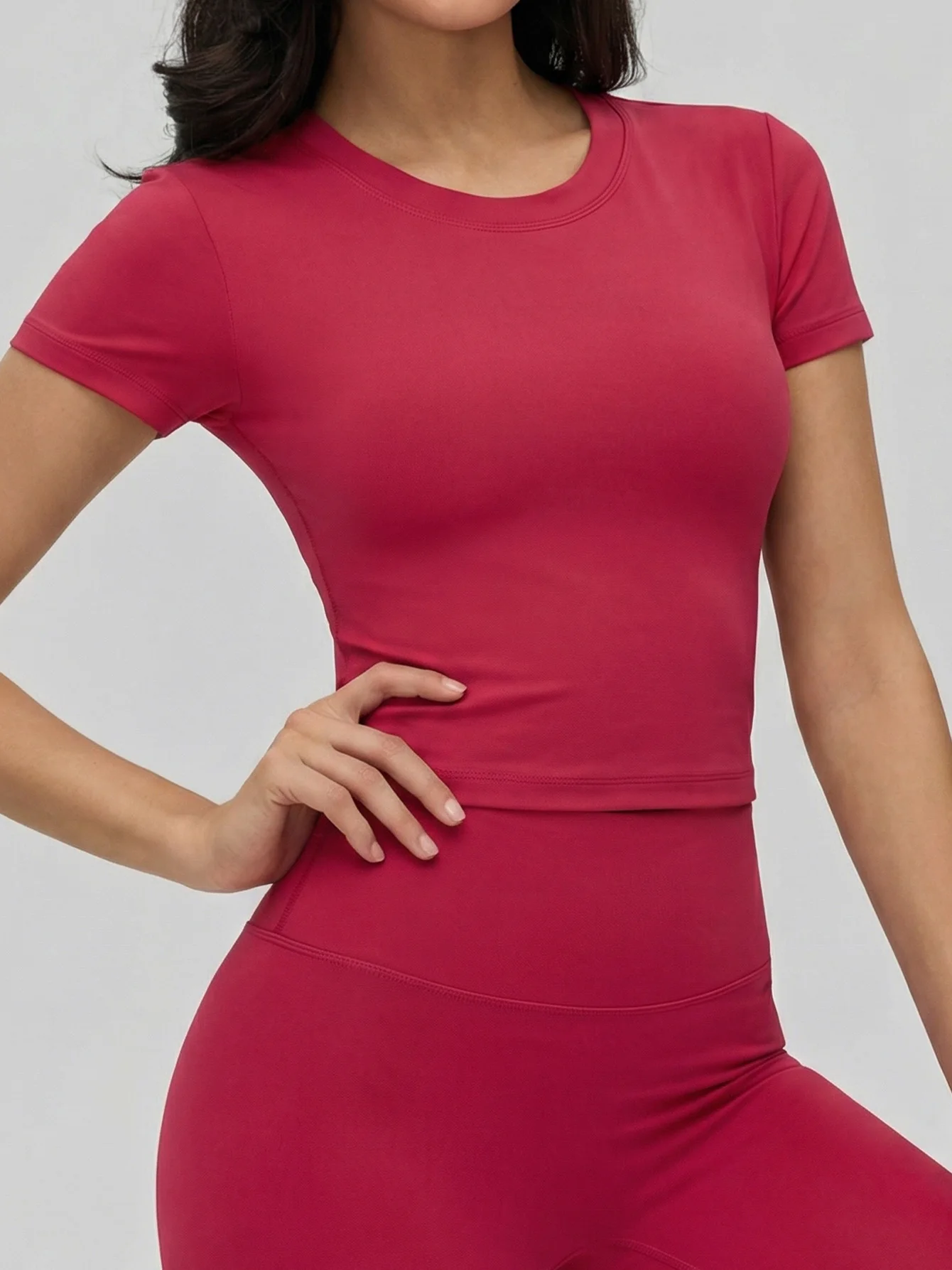 

2026 Summer Women's open-back yoga fitness T-shirt, sexy backless design with chest pads, slim waist workout top.