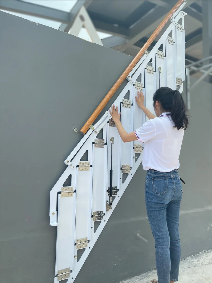 Folding stairs against the wall for household attic with side wall mounted step ladders