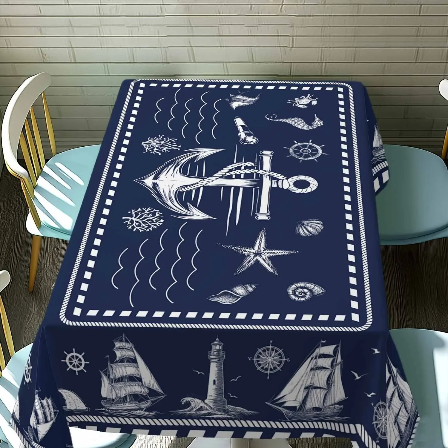 One nautical-themed tablecloth in navy blue coastal style, featuring patterns of anchors, lighthouses and compassesxzj