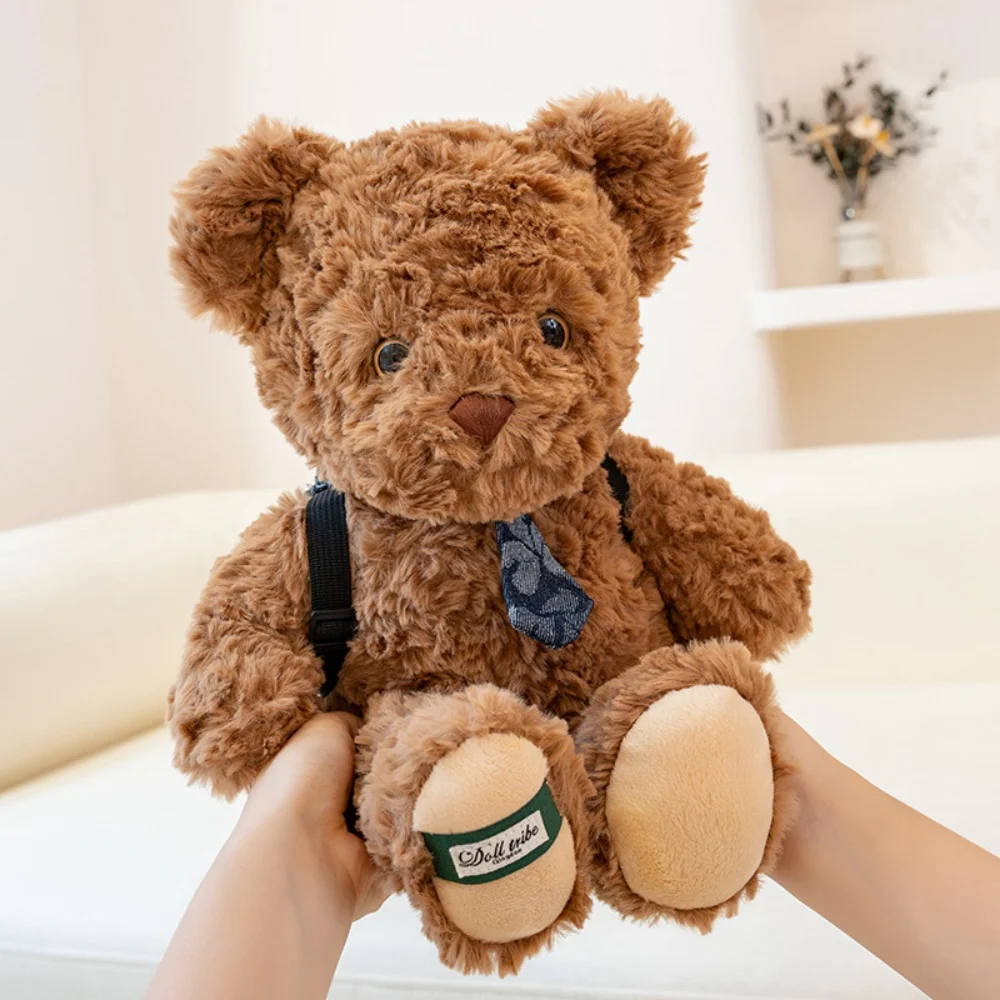 ตุ๊กตาหมีผูกเนคไท 3 สี การ์ตูนน่ารัก ตุ๊กตาหมีนุ่มนิ่ม ของเล่นตุ๊กตาหมีนุ่มๆ กระเป๋าเป้สะพายหลังหมีเท็ดดี้ ของขวัญวันเกิด/คริสต์มาส