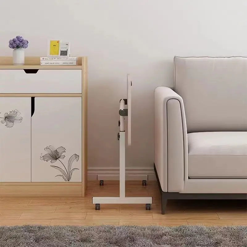 The Laptop Desk Rotates and Moves The Small Bedside Table