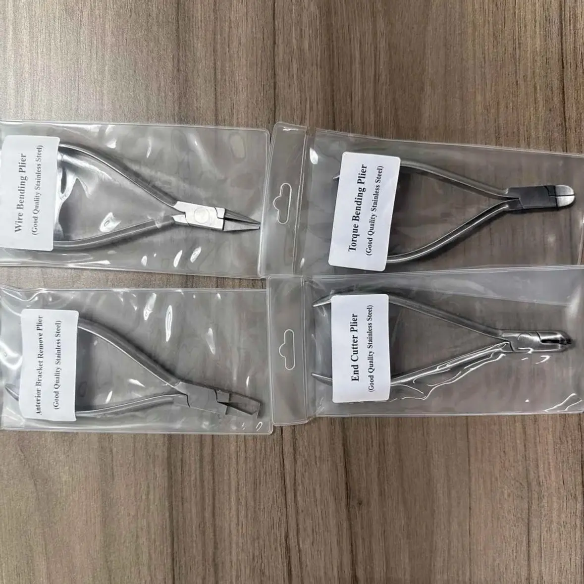 

Orthodontic Pliers Good Quality End Cutter Plier, Wire Bending Plier, Anterior Bracket Remover Plier, Torque Bending Plier