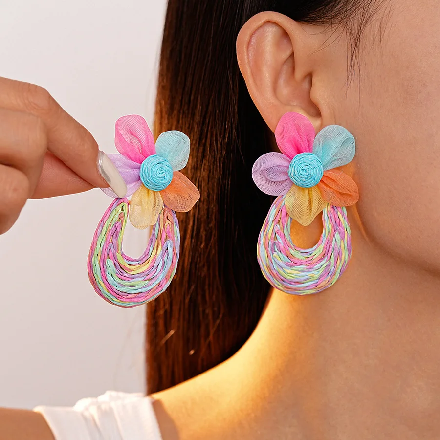 Early spring hand-woven lace flower raffia U-shaped steel needle earrings, girlish temperament high-end earrings women