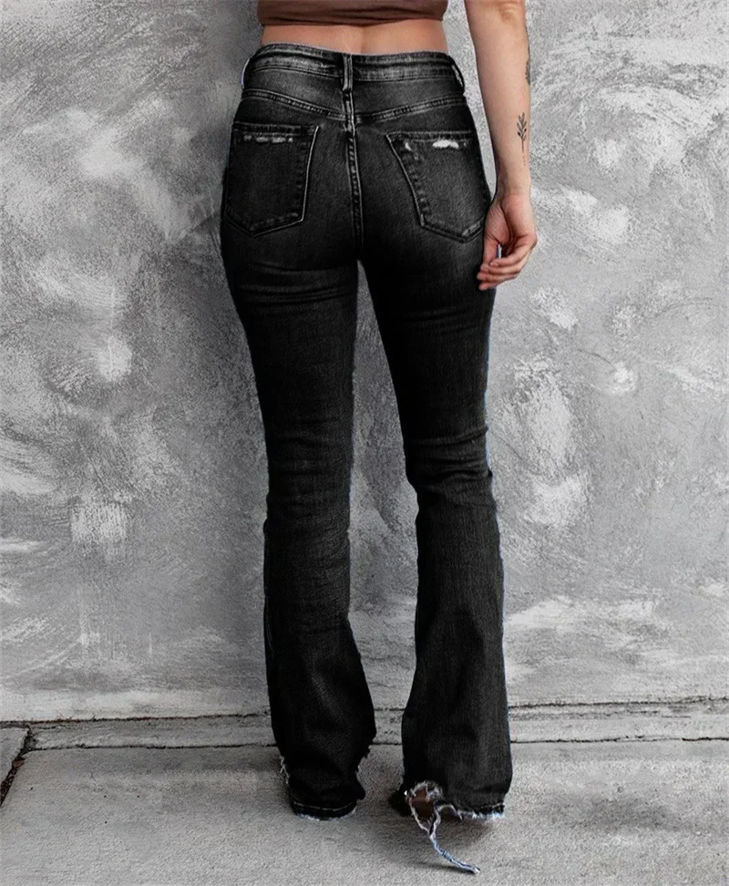 Vintage zepsute dziury rozkloszowane dżinsy Streetwear wysokiej talii zmywalne bawełniane spodnie dżinsowe spodnie z guzikami dla kobiet w nowym amerykańskim stylu