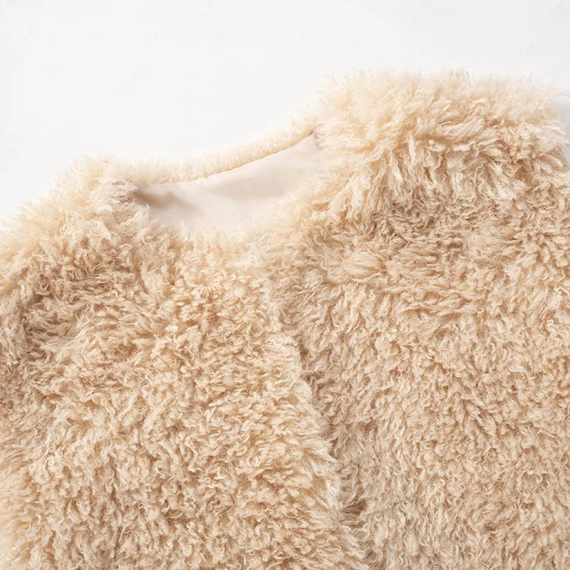 Gilet corti da donna in pelliccia di agnello sintetica senza maniche giacche pelose larghe tinta unita O collo Taddy cappotti di peluche cardigan soffici alla moda invernale