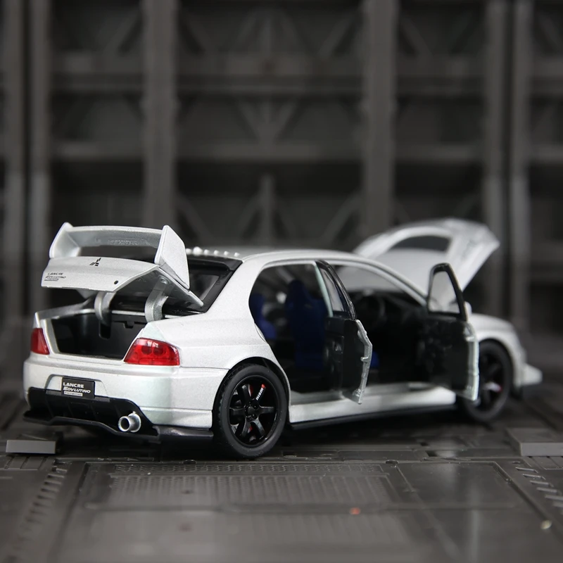 1:32 Mitsubishi Lancer Evolution alliage rallye modèle de voiture ornements de voiture collection acousto-optique retirer vers les jouets pour enfants.