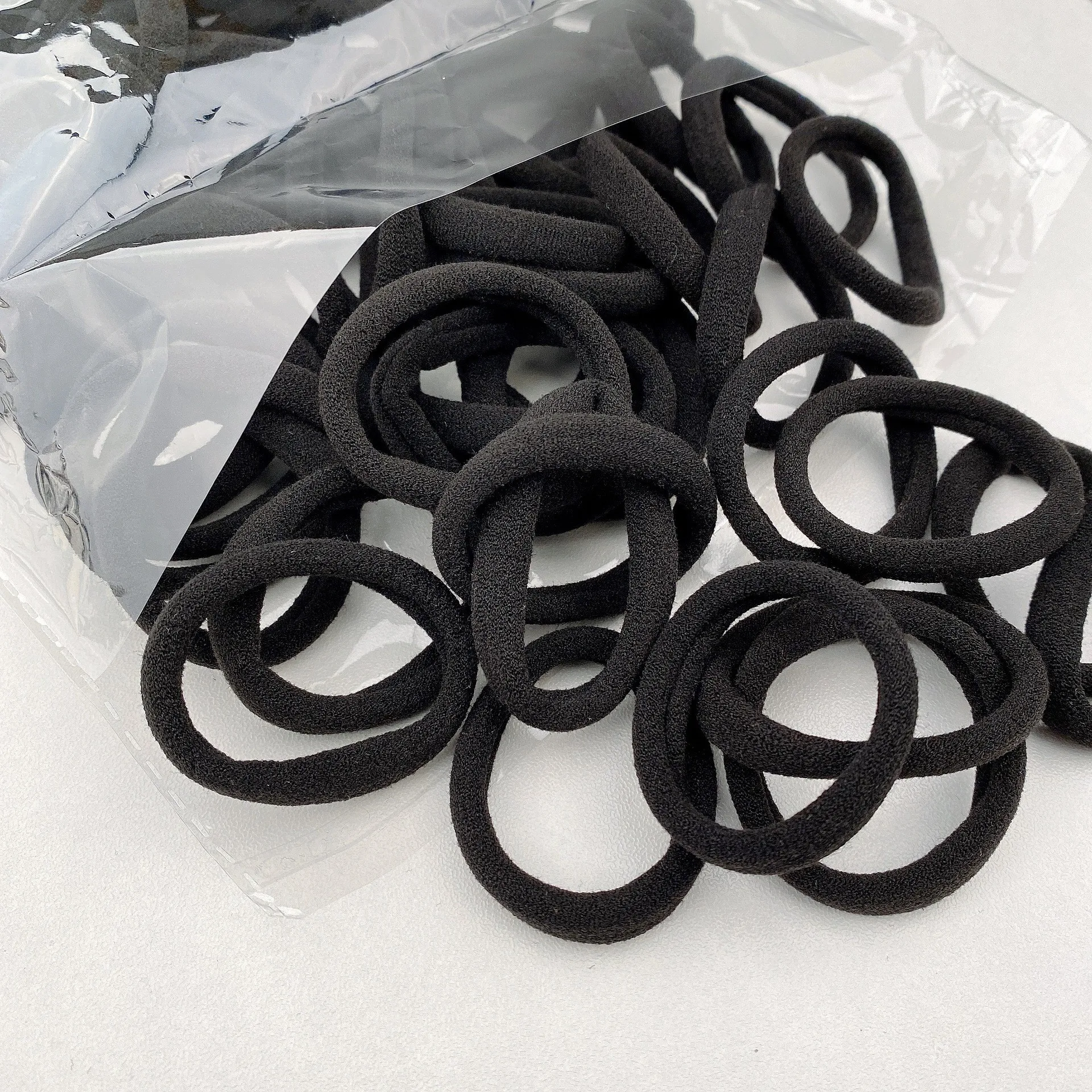 Four Seasons Damen-Stirnband, hochelastisch, schlicht und modisch, Nylon-Loop-Zugang, weiches und nicht schädliches Stirnband und Schachtelhalm-Haarseil