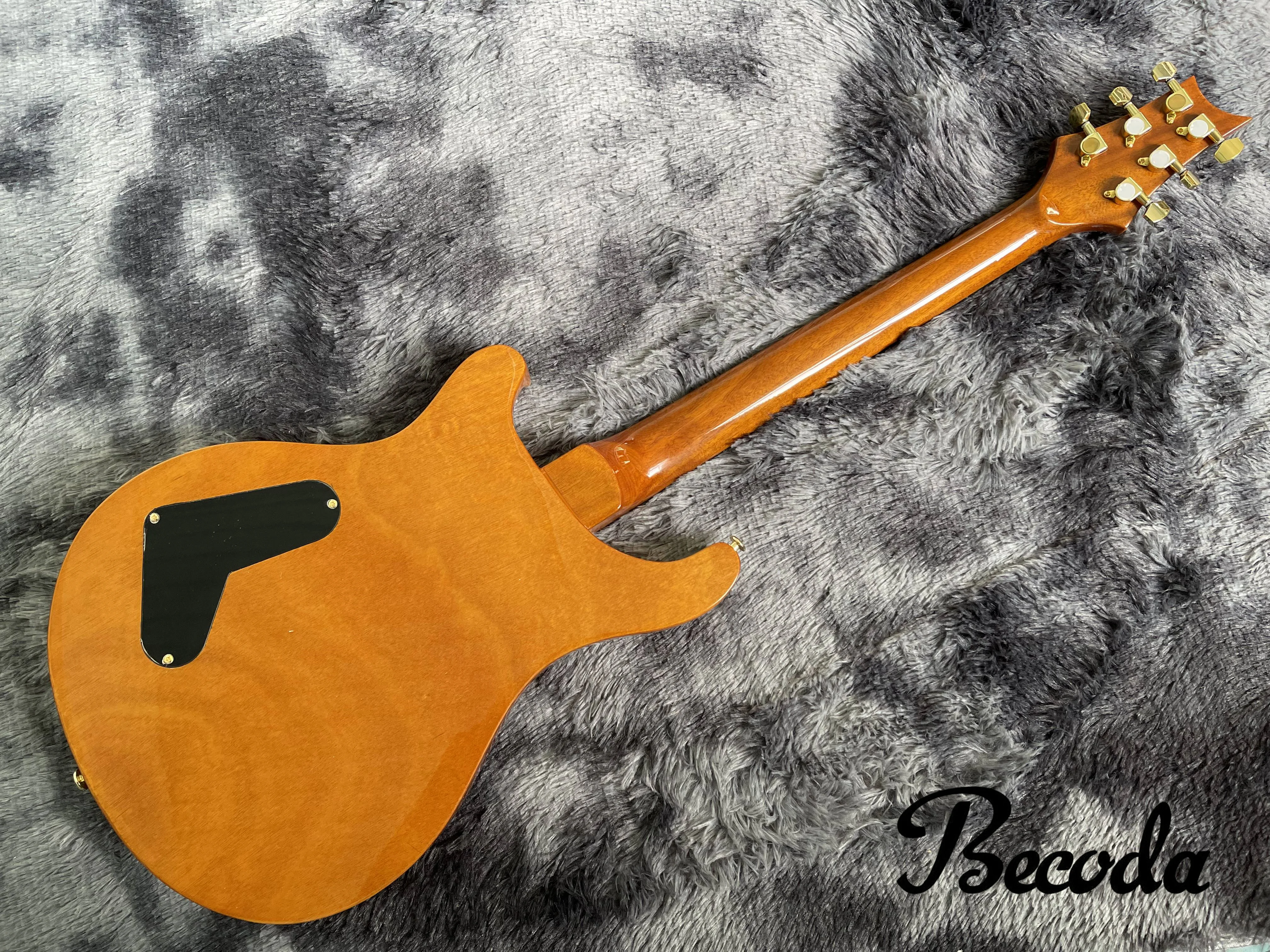 China Becoda OEM  Electric Guitar PR sguitar Dragon body maple top, in stock.