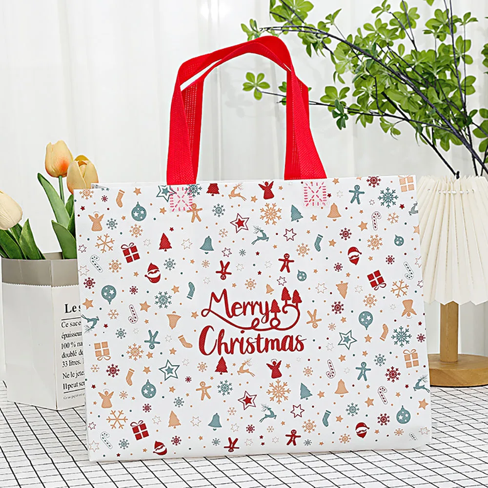 هدية عيد الميلاد حقيبة غير المنسوجة سانتا ثلج شجرة عيد الميلاد حمل التعبئة والتغليف الحقيبة مقاوم للماء حقيبة يد للتسوق عيد الميلاد السنة الجديدة أكياس الحلوى