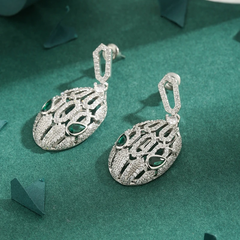 A pair of high-quality cubic zirconia heavy industry mask green Zircon design light luxury chic earrings for ladies gift