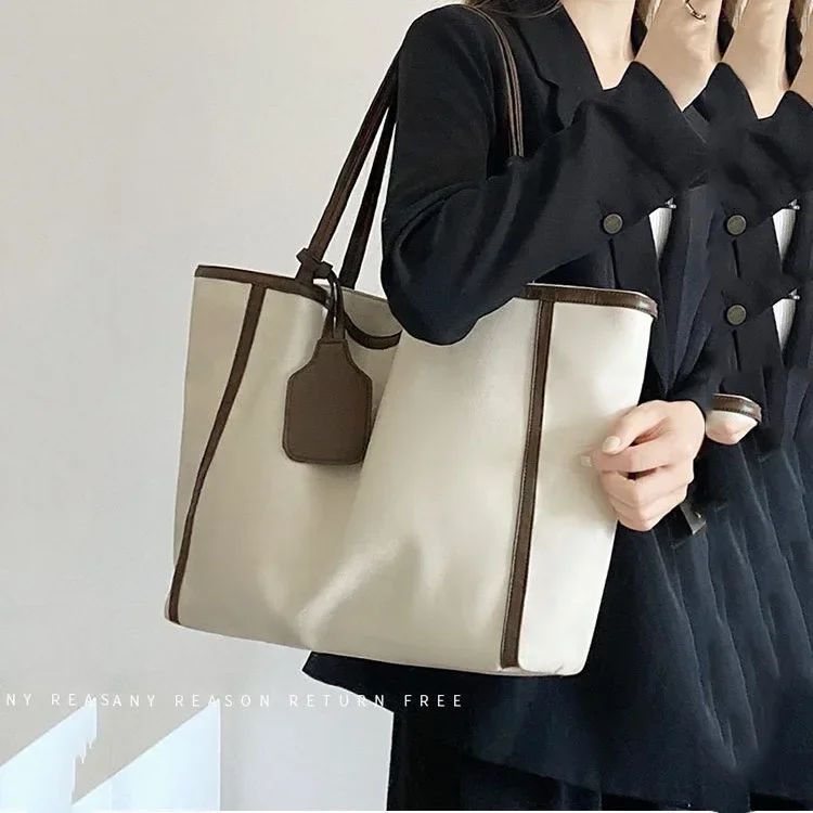 New Fashion Versatile Texture Large Capacity Simplicity with Hanging Tag Accessories Splicing Shoulder Support Special Bag