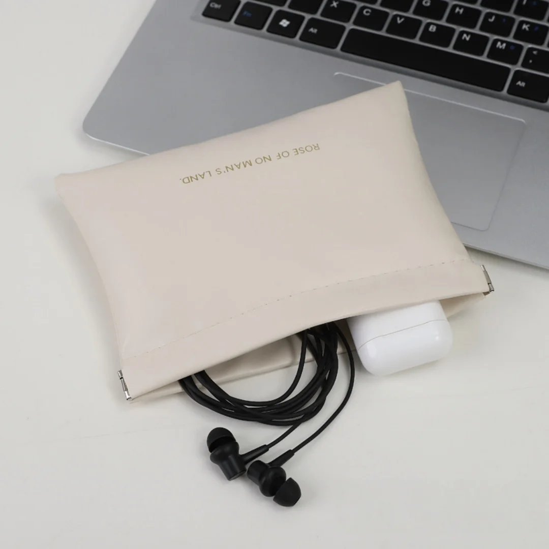 

Minimalist PU Leather Self-Closing Pouch Cosmetic Storage Bag Portable Lipstick Earphone Organizer for Women.