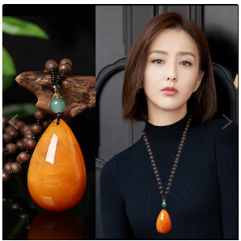 Ethnic style imitation beeswax drop necklace nucleus beads long sweater chain female imitation amber pendant