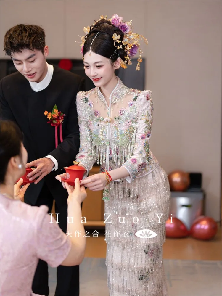 The light-colored wedding dress is used to rework bride's fishtail