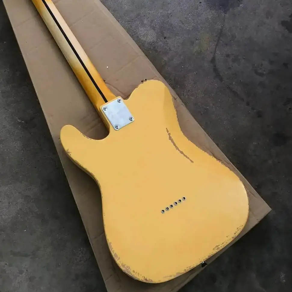 Milk yellow six-string old electric guitar, basswood body, maple neck, black panel support personalized customization.